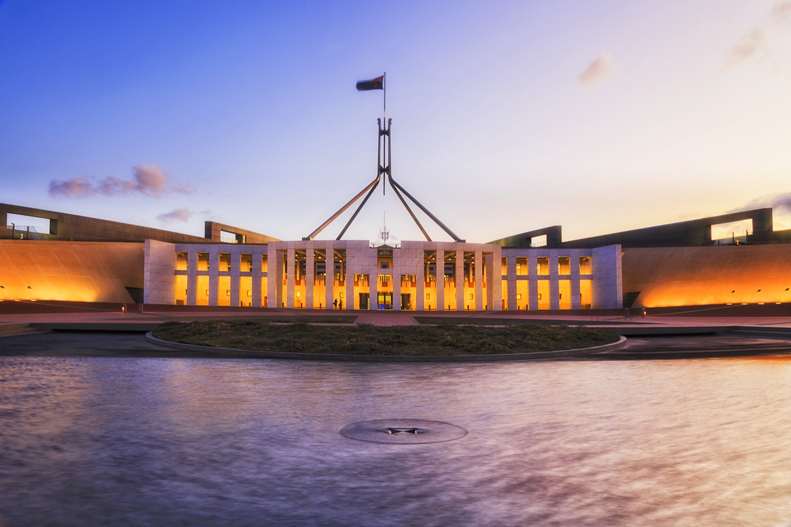 Australian Parliament House, Canberra, illuminated at dusk